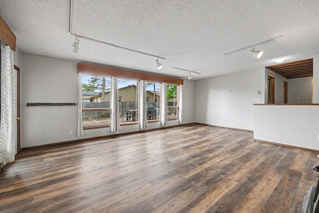 Living room with large windows at 2126 Genoa Court