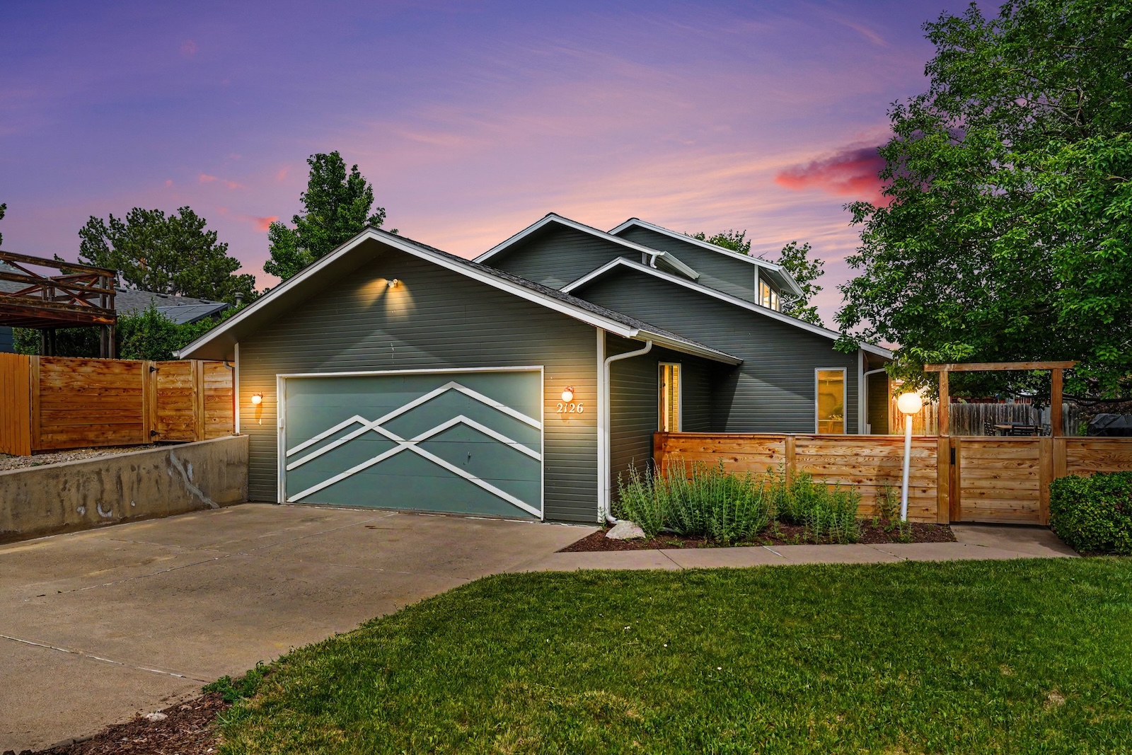 Front exterior of 2126 Genoa Court in Loveland, Colorado across from Mehaffey Park