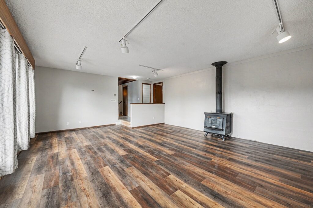 Cozy wood-burning stove in the living room at 2126 Genoa Court