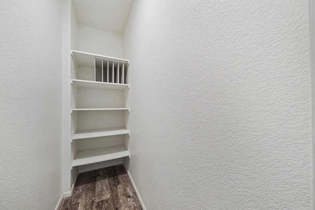Large mudroom with storage off the attached garage at 5370 Silverleaf Ave