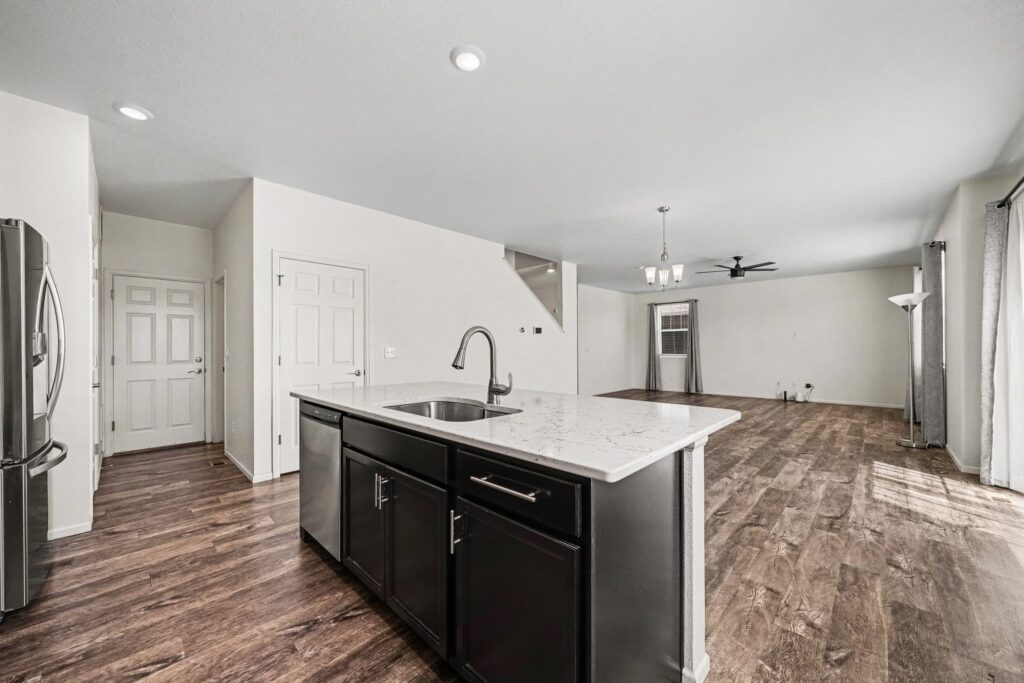 Open kitchen and living area designed for gathering at 5370 Silverleaf Ave