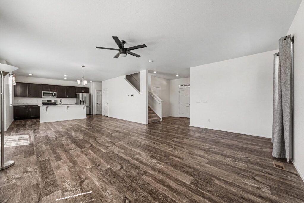 Open main-level living, dining and kitchen spaces at 5370 Silverleaf Ave