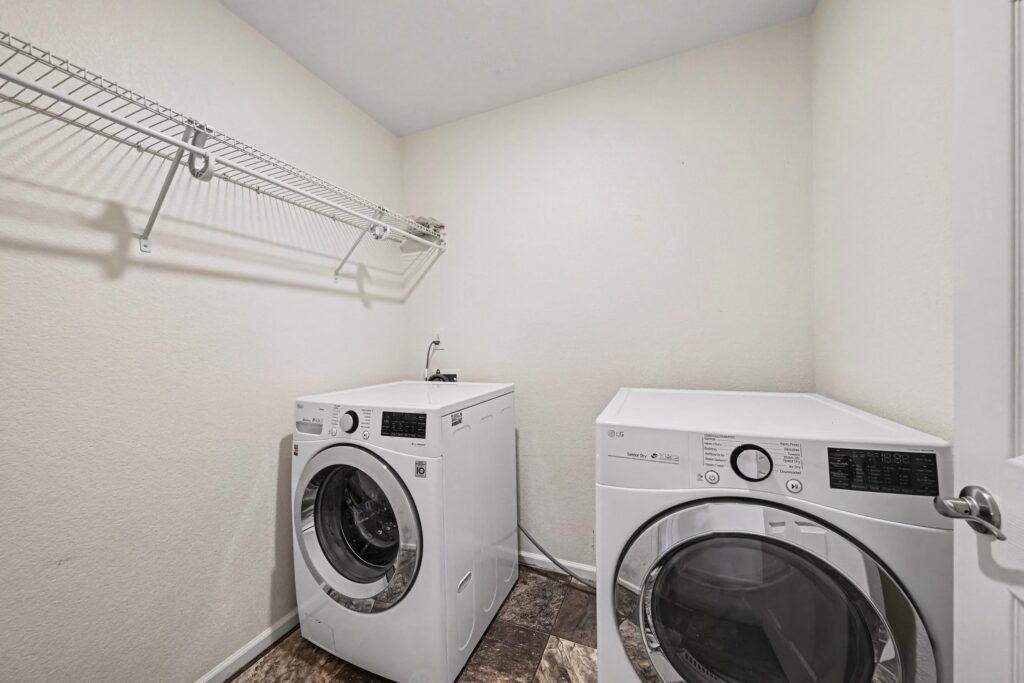 Second-floor laundry room conveniently located near all four bedrooms